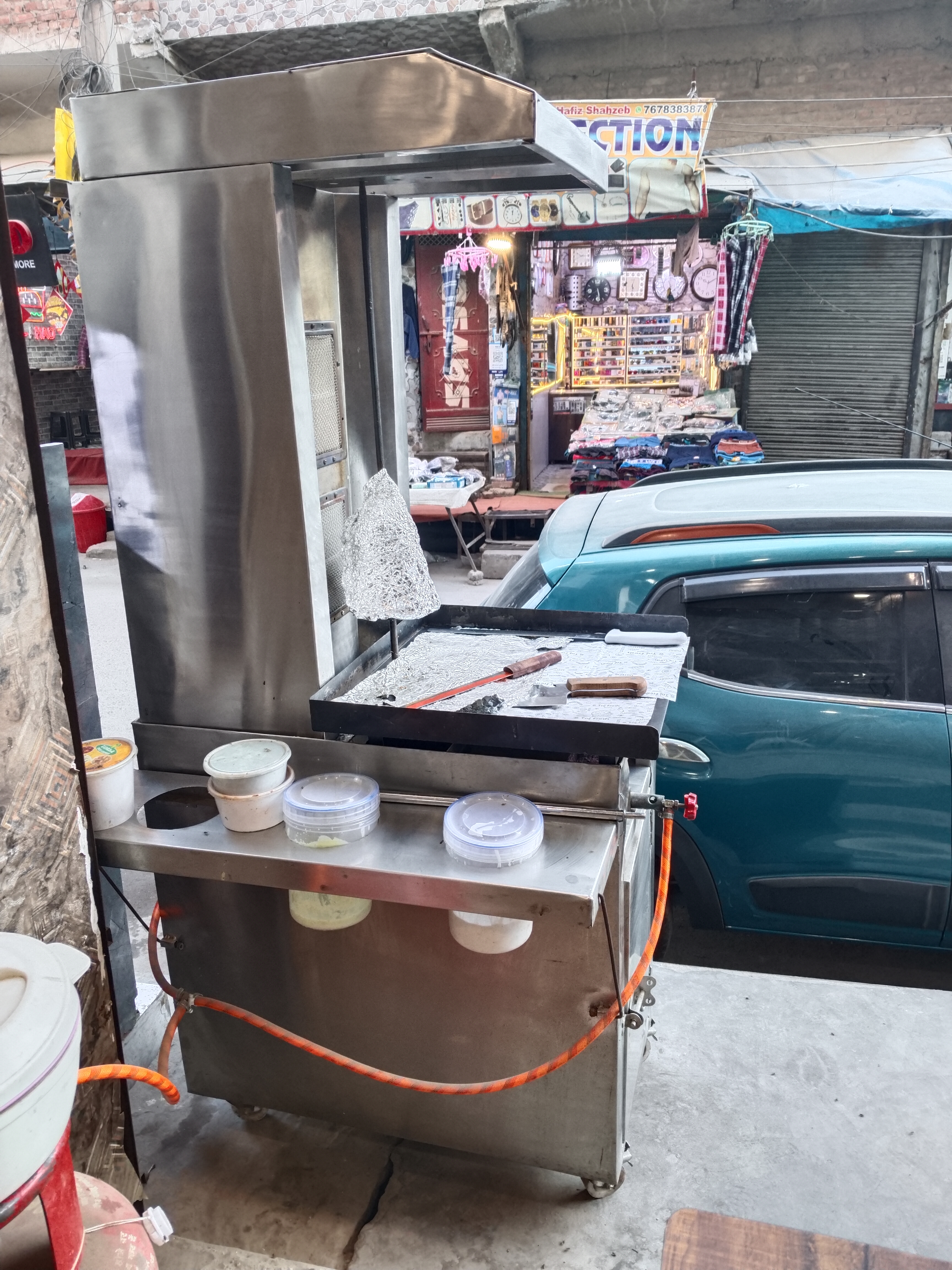Deep fridge shawrma machine griller double frayer hot plate cash counter table and chair available for sale