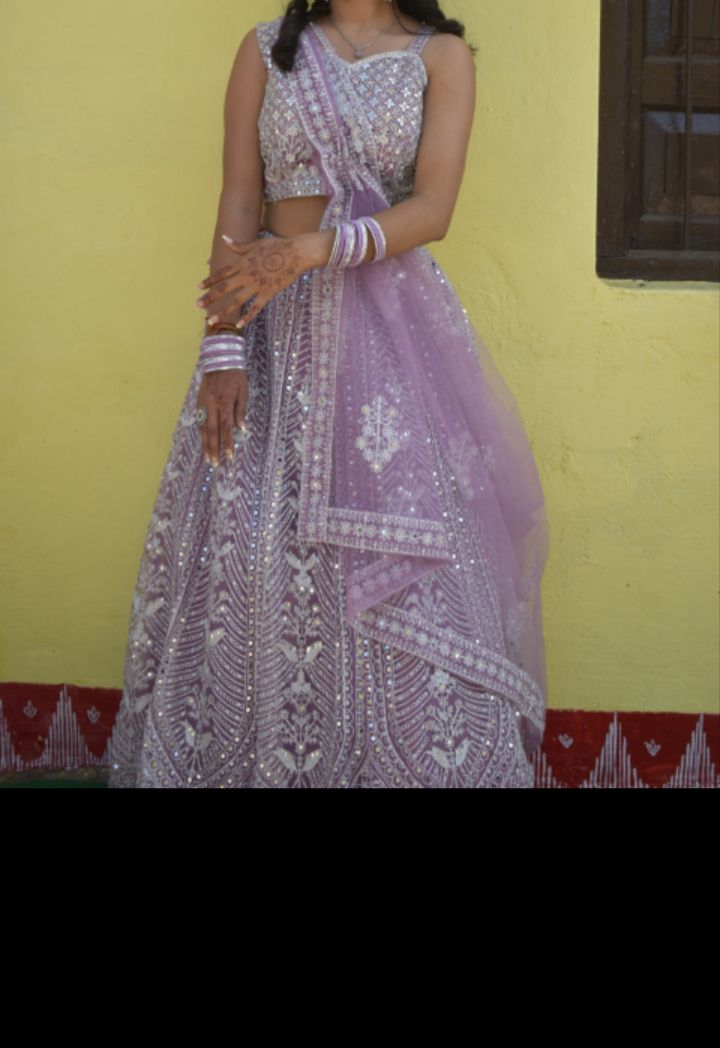 2 Lehenge 1  haldi dress 1  sangeet dress one wear price 2000  available for sale