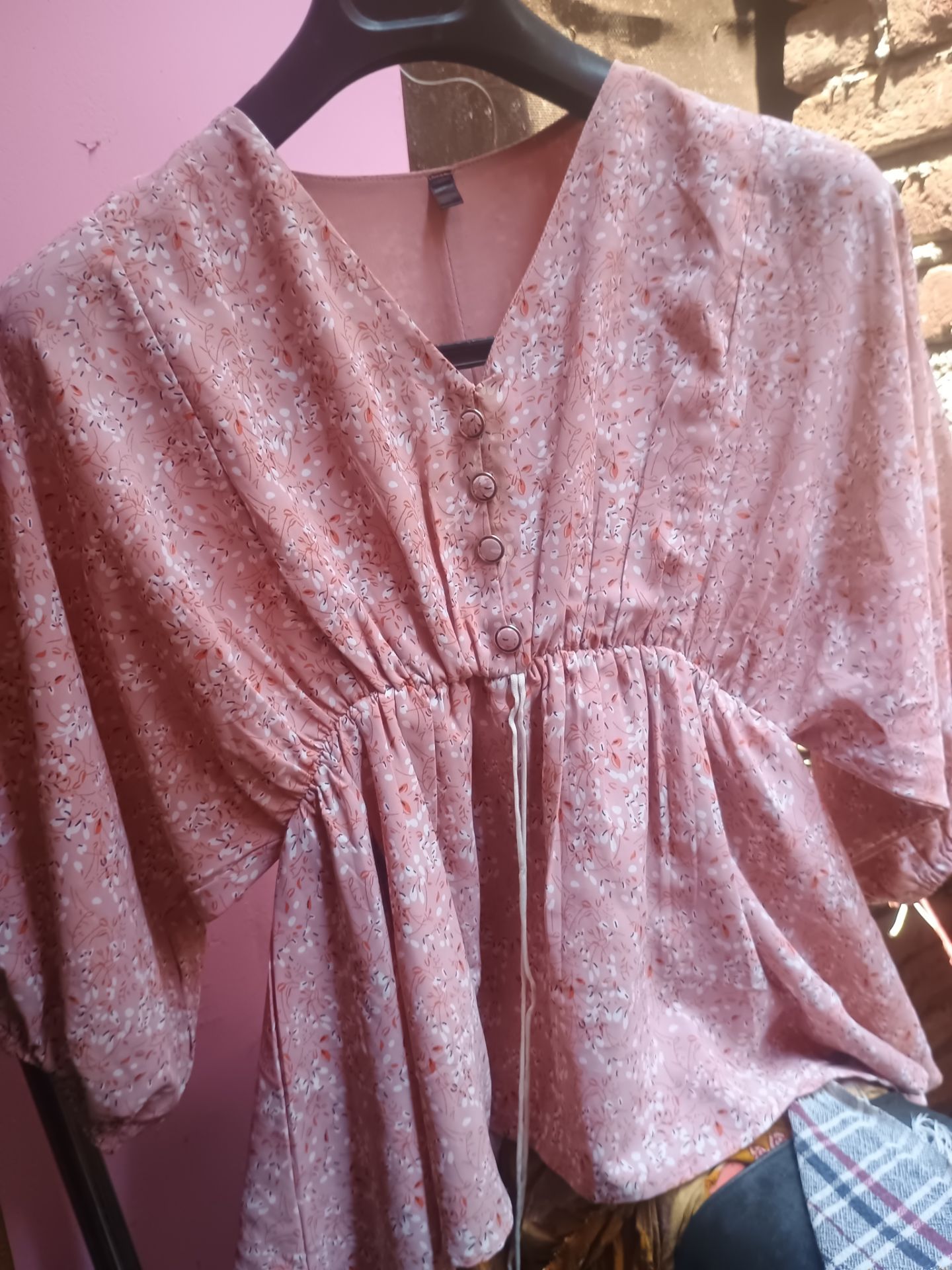 I'm selling a cute pink top available for sale