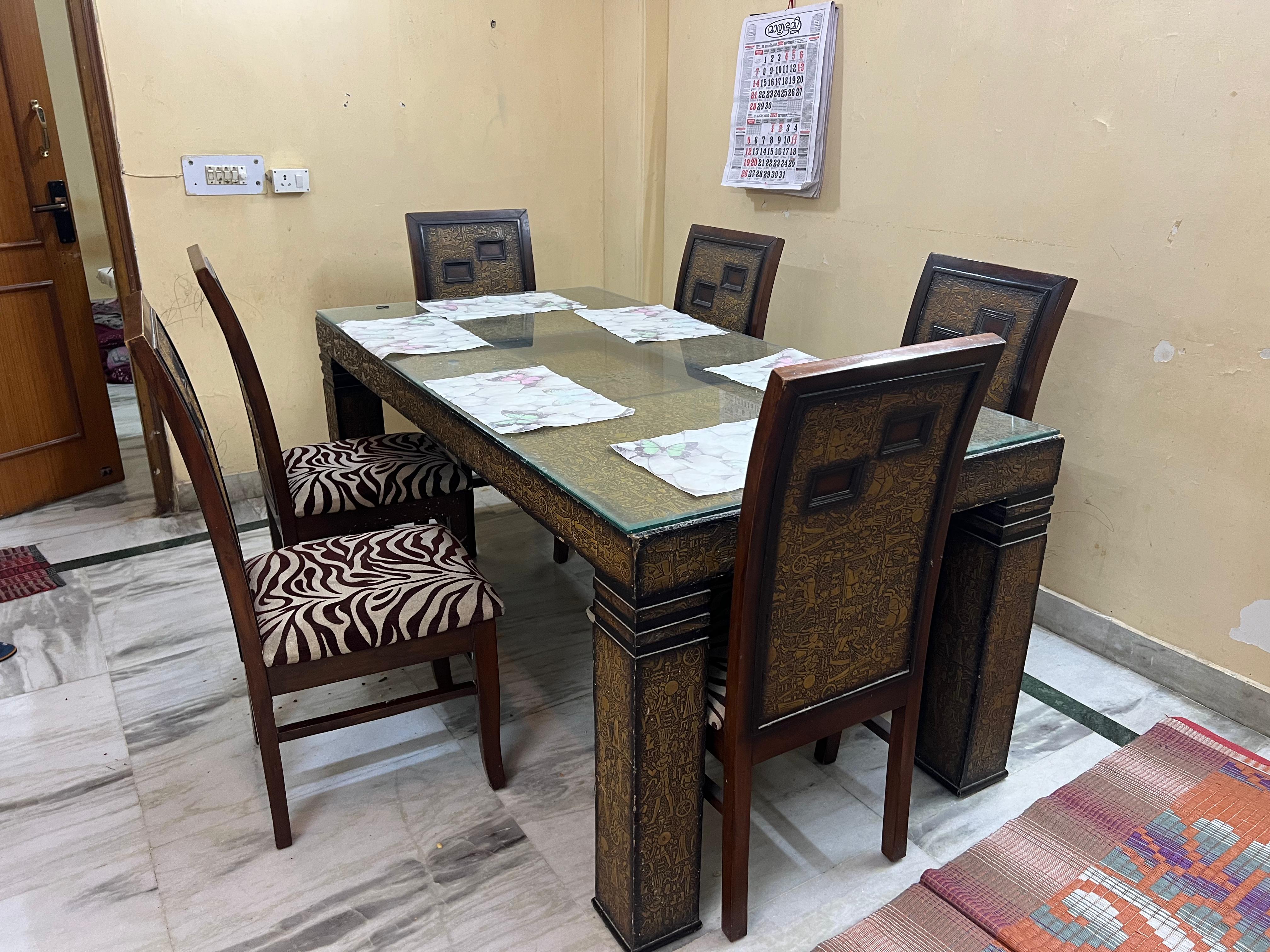 Dining table and Sofa bed available for sale