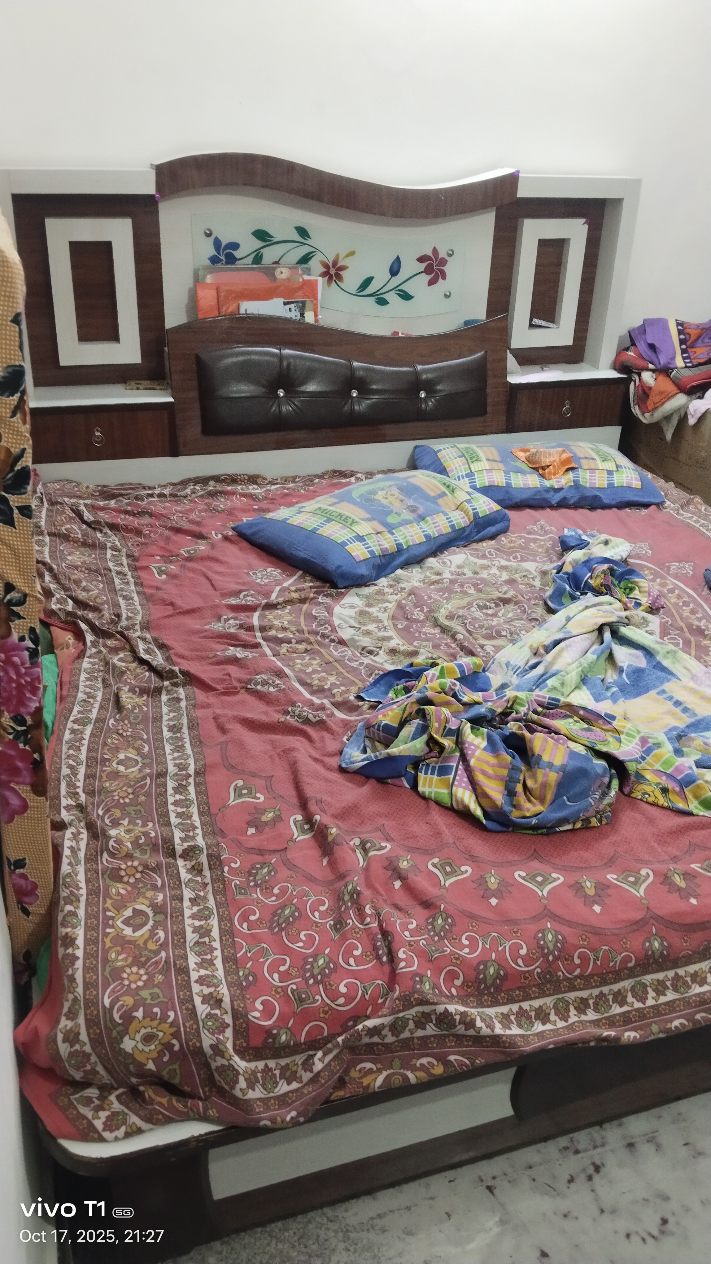 Double bed with mattresses available for sale
