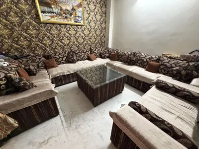 12 seater sofa with a couch and center table