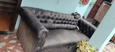  5 seater sofa in good condition with black leather cover 