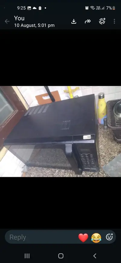 18 months old good condition newly look microwave oven urgent sale 